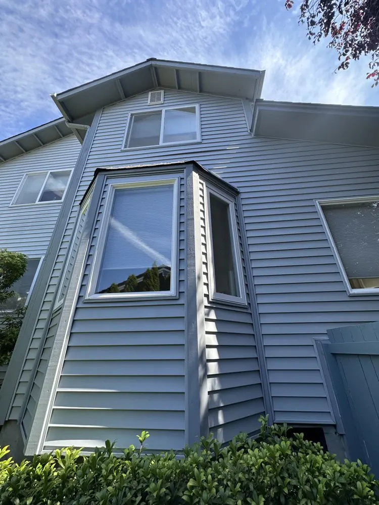 Three-story house after pressure washing