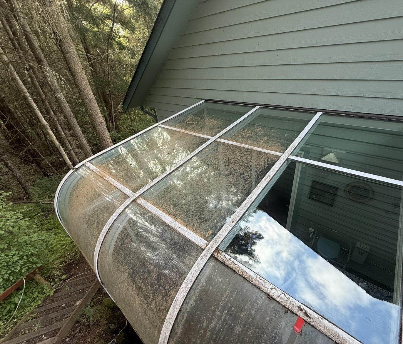 Sunroom windows, dirty left side vs. cleaned right side